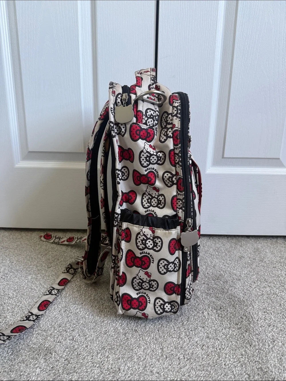 Ju-Ju-Be Hello Kitty Cream Backpack with Red & Black Bow Print